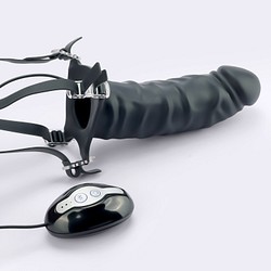 Vibrating hollow strap-on