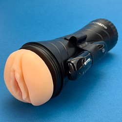 Vibrating pussy in a plastic case